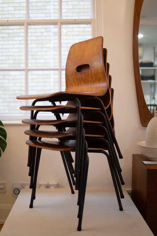 Q Cherrywood Q stack chairs (1953) by Robin Day for Hille