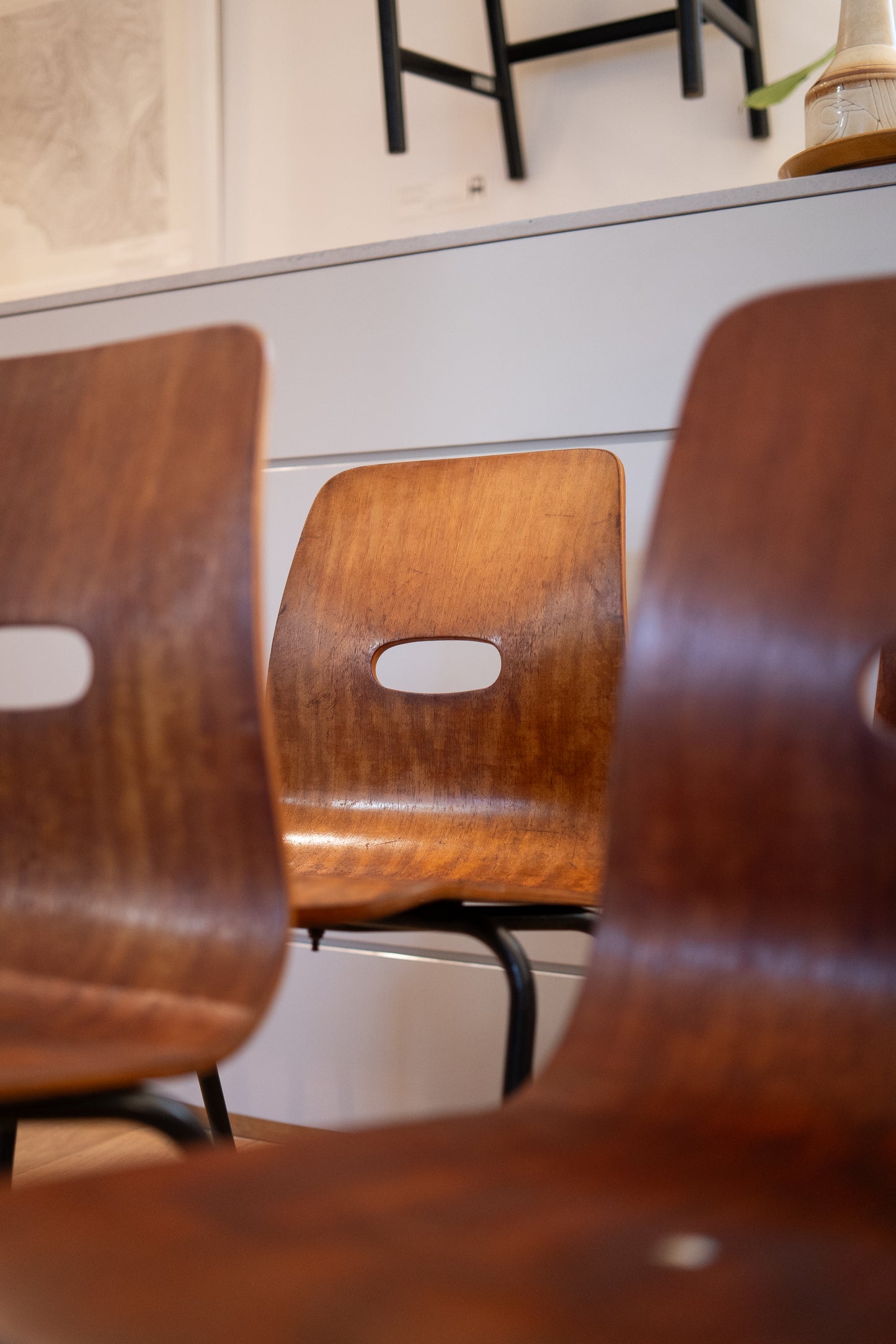 Q Cherrywood Q stack chairs (1953) by Robin Day for Hille