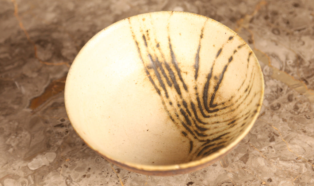 Midcentury Sgraffito bowl in cream glaze with brown detailing