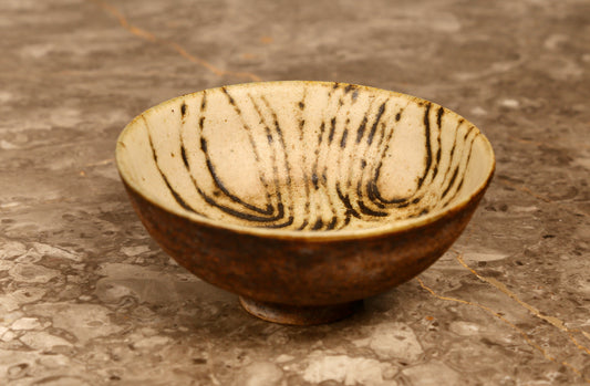 Midcentury Sgraffito bowl in cream glaze with brown detailing