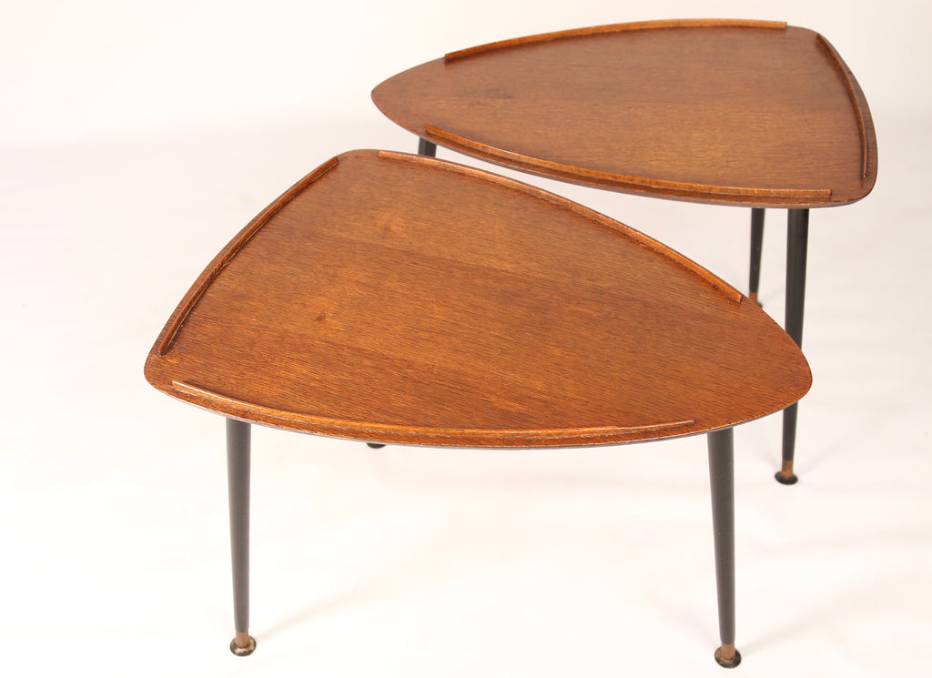 Pair of 1950s oak shield-shaped occassional tables on black tapered legs