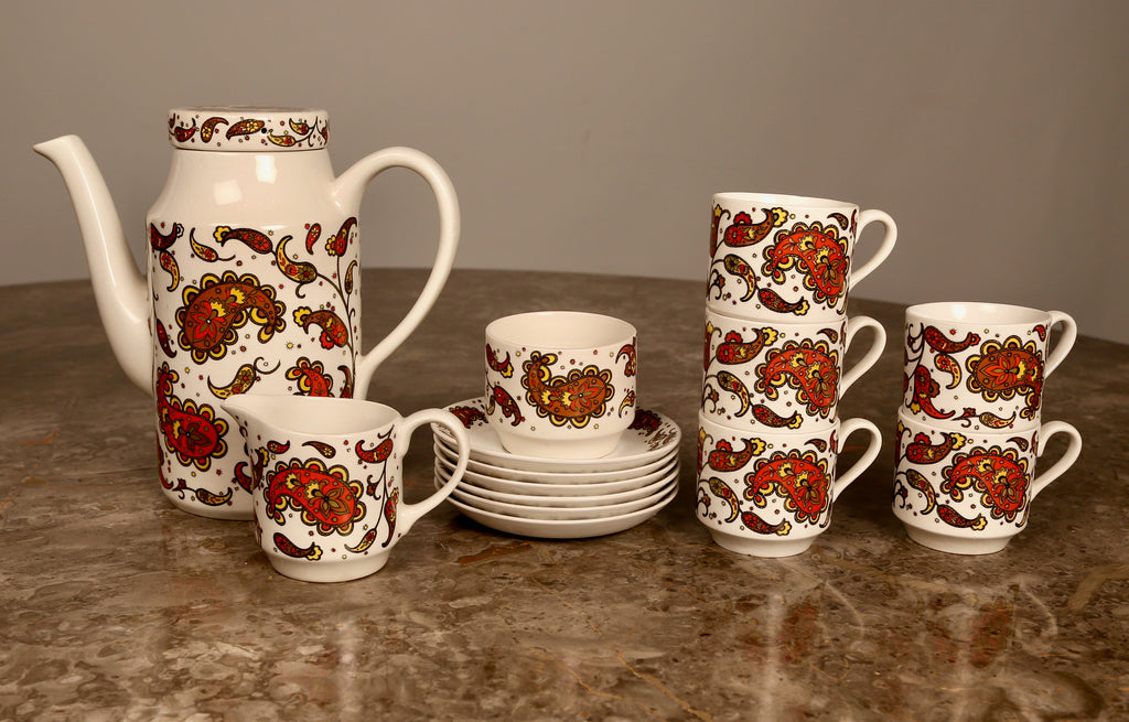 A midwinter pottery coffee set in 'Scarce Baroque' pattern by Jesse Tait (1960s)