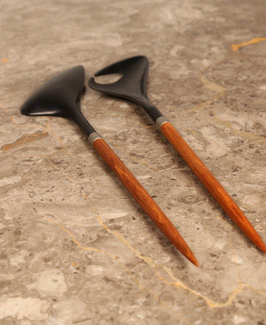 A pair of Danish salad servers in teak and black plastic designed by Helge Bezi, Denmark (1960s)