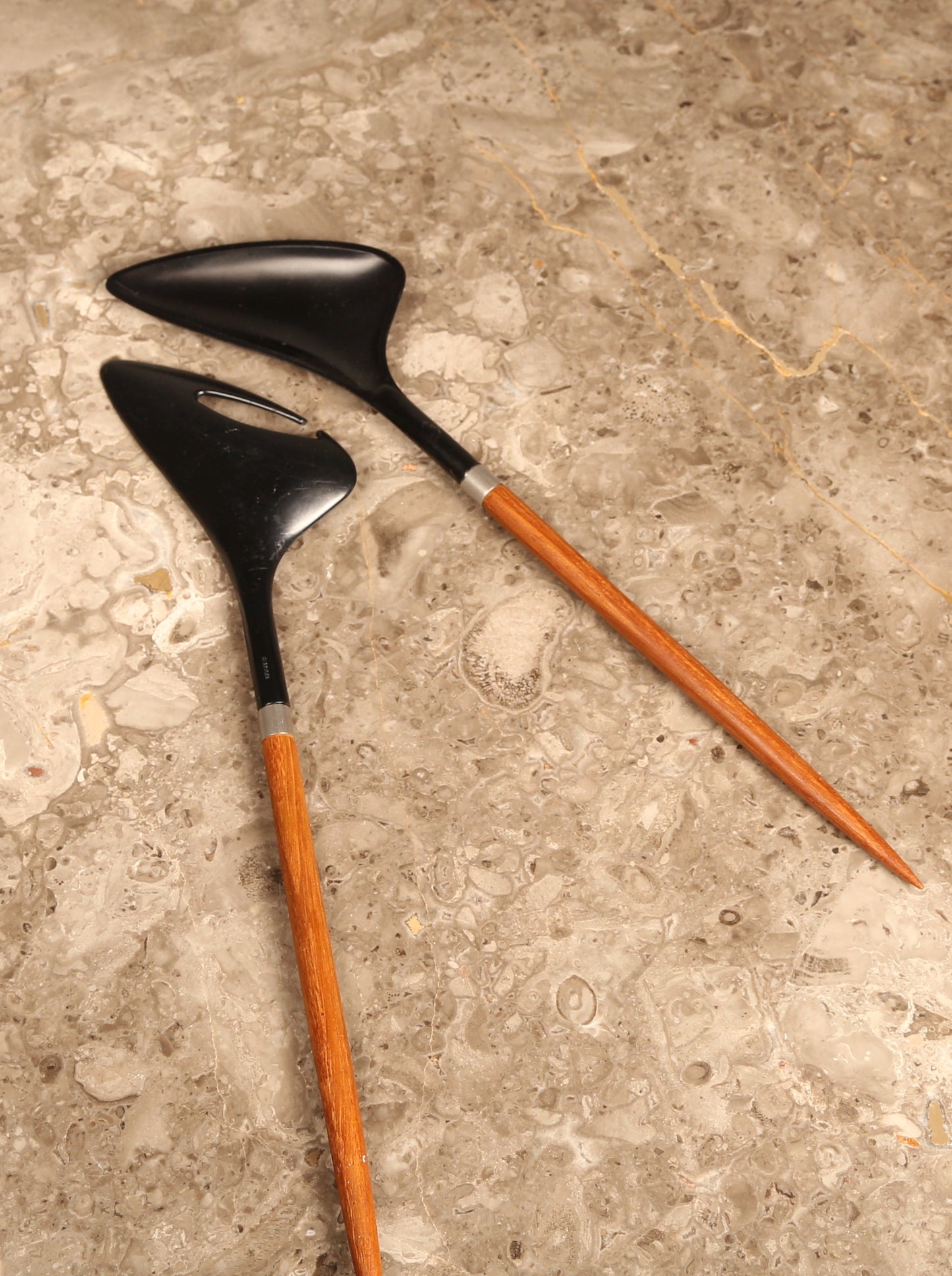 A pair of Danish salad servers in teak and black plastic designed by Helge Bezi, Denmark (1960s)