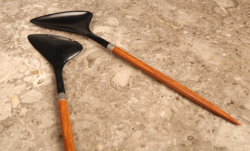 A pair of Danish salad servers in teak and black plastic designed by Helge Bezi, Denmark (1960s)