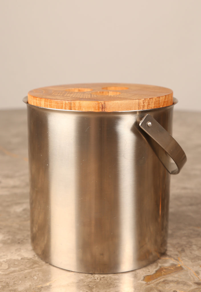 Arne Jacobsen for Stelton, a stainless steel 1960s ice bucket and tongs with teak lid (1960s) Denmark