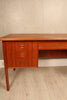 1960s teak kneehole desk with intregrated shelf