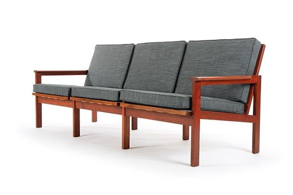 llum Wikkelso for Niels Eilersen, a 1960's teak three-seater 'Capella' sofa and armchair