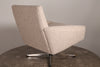 Midcentury swivel chair in pure wool boucle