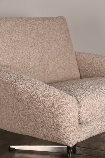 Midcentury swivel chair in pure wool boucle