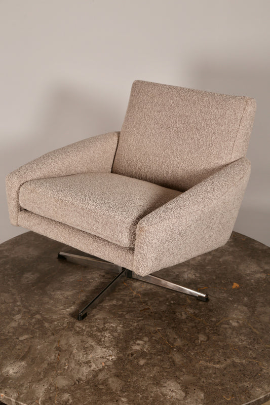 Midcentury swivel chair in pure wool boucle