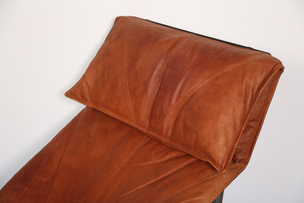 A pair of tan leather Skye Loungers by Tord Björklund for Ikea (1980s)